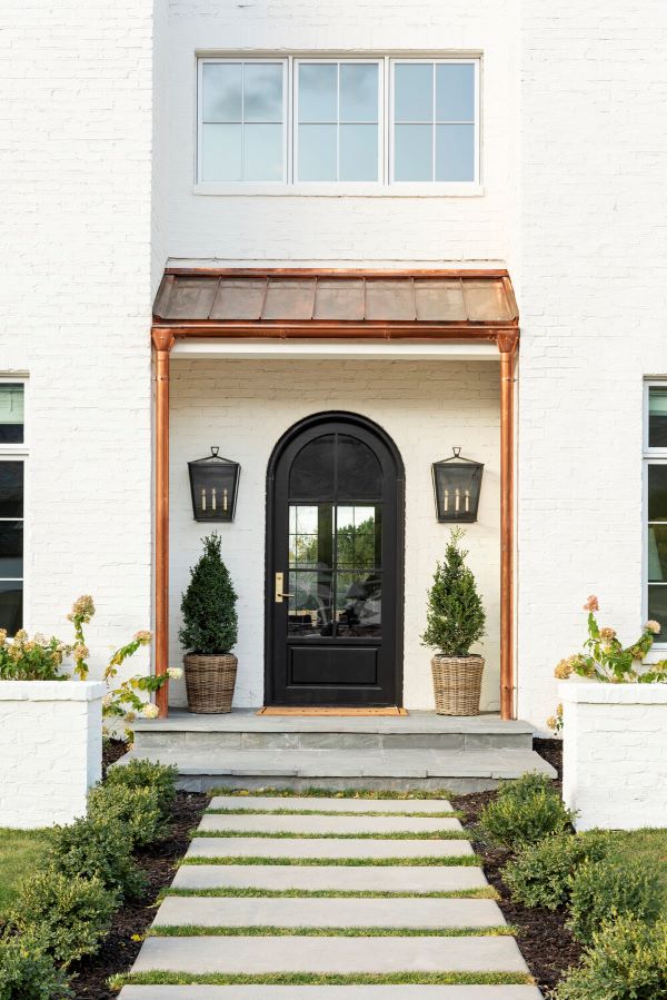 arched front door home exterior